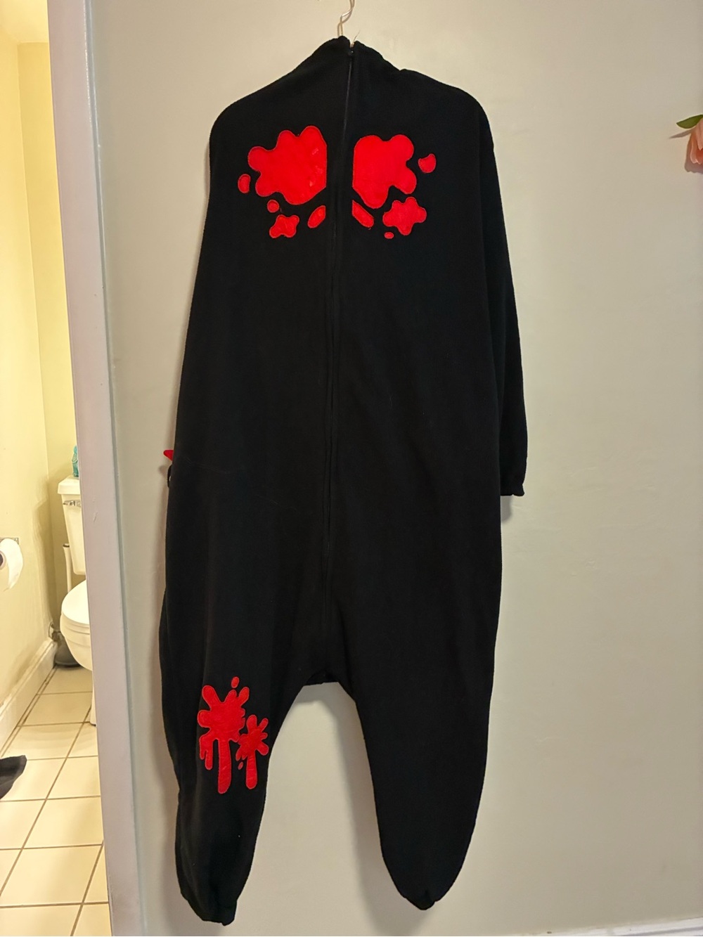 Kids Black One-Piece Hoodie with Red Splash Accents